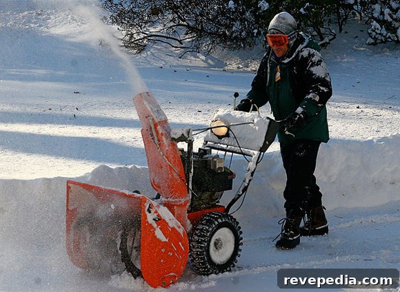 How to Safely Dig Out Your Car and Walkways After Snowstorm 2 snowblower-safety.jpg