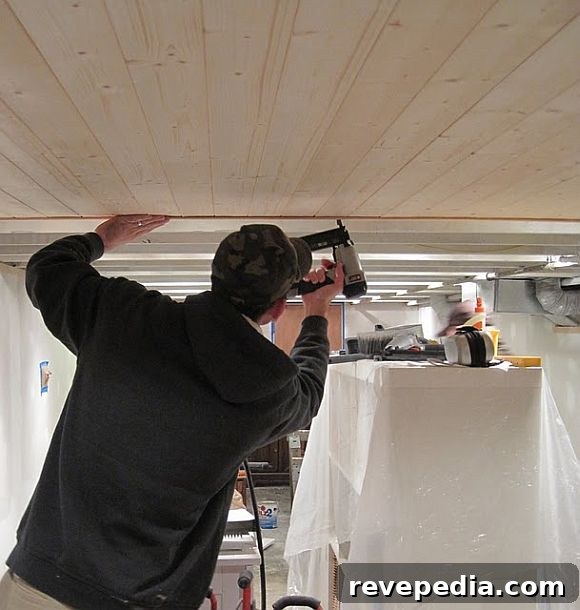 Pine Plank Ceilings: DIY Ideas & Step-by-Step Guide 2 InstallingPinePlankCeiling.JPG