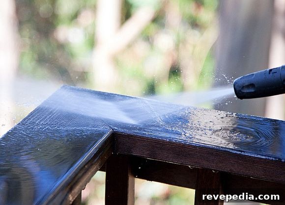 Pressure washer cleaning a deck PressureWasher.jpg
