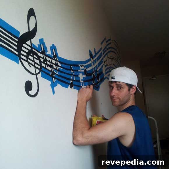 How to Paint a Stunning Wall Mural Yourself 2 wall-mural-with-tape.jpg