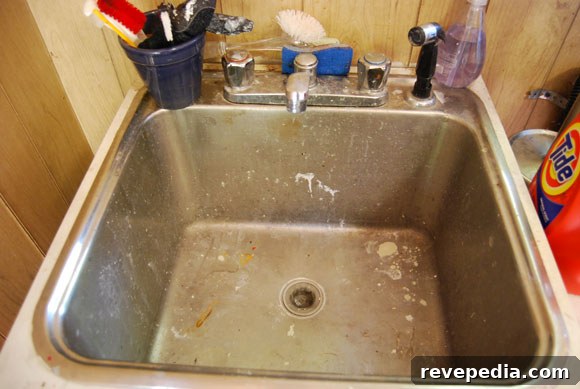 Top Laundry Room Upgrades to Transform Your Space 4 dirty-sink.jpg
