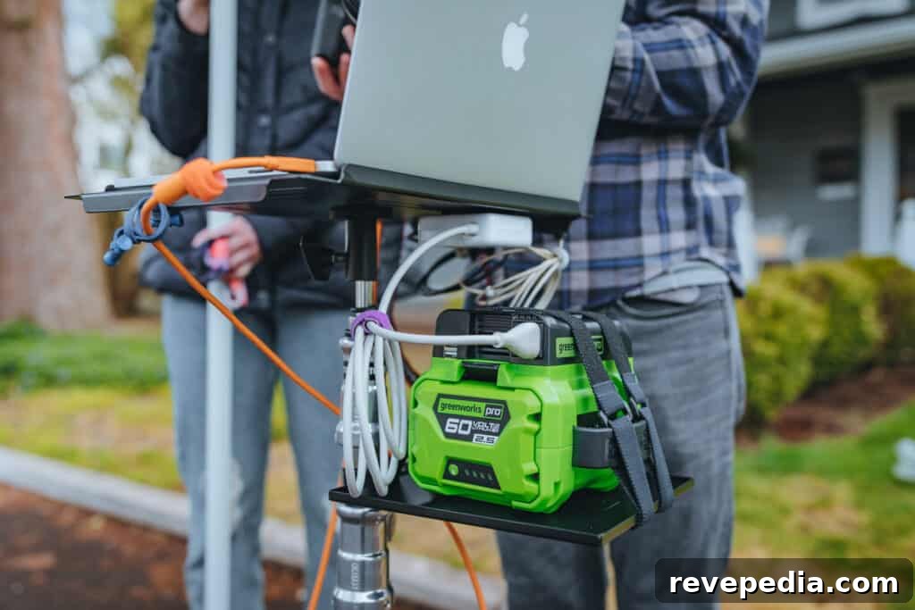 Greenworks 300W inverter attached to 60V battery