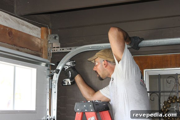 mike-installing-track.jpg