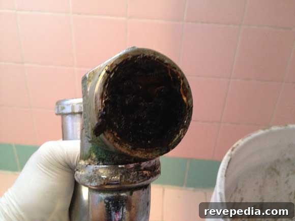 Fixing a Misaligned P-Trap: Step-by-Step Guide for Proper Drain Alignment 3 ptrap-clogged.jpg