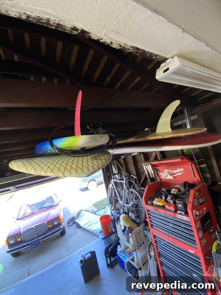 Install a Garage Surfboard Rack to Protect Your Surf Quiver 5 hanging garage surfboard rack
