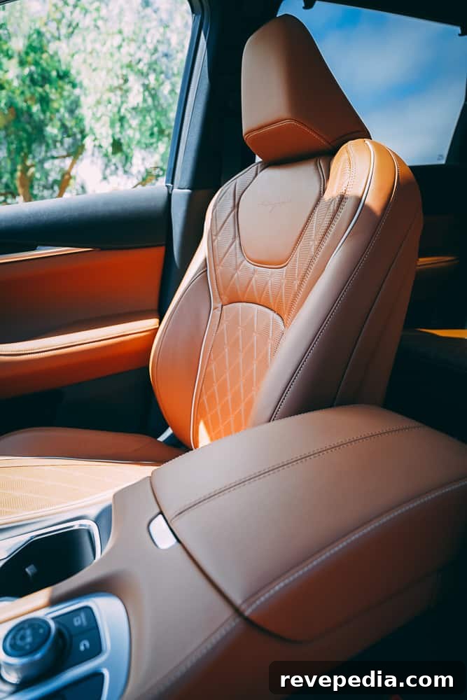 2024 Infiniti QX60: New Luxury Features and What’s Changed 15 Close-up of seat stitching