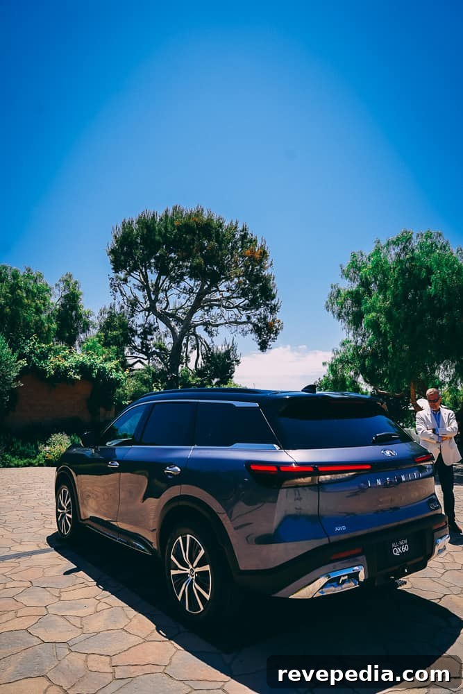 2024 Infiniti QX60: New Luxury Features and What’s Changed 46 Rear view with open tailgate