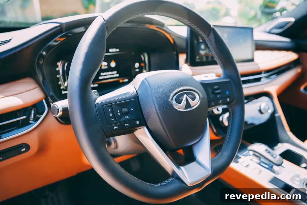 2024 Infiniti QX60: New Luxury Features and What’s Changed 10 Quilted leather seats and wood trim