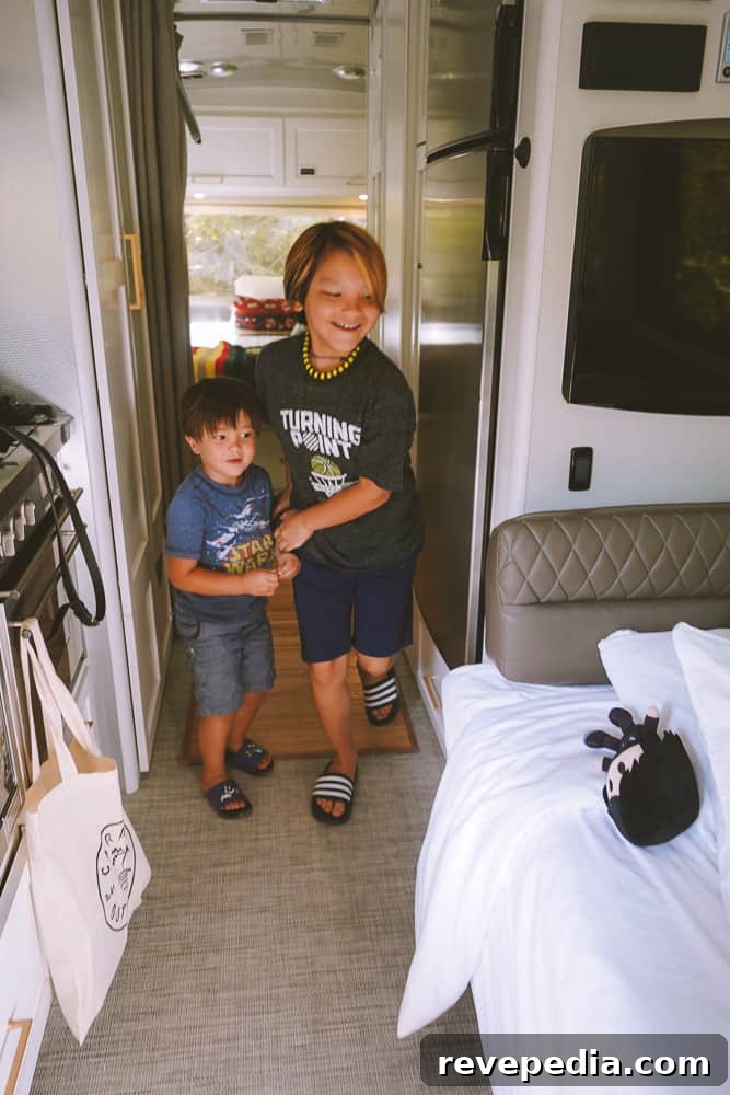Glamp at Caravan Outpost in Ojai: Luxe Outdoor Getaway 11 Family enjoying Airstream