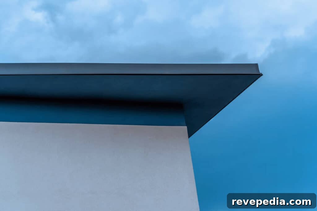 Modern flat roof building against blue sky