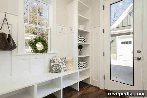 Preparing Your Home for a Growing Family: Practical Upgrades and Tips 2 White entryway with bench and mirror, ideal