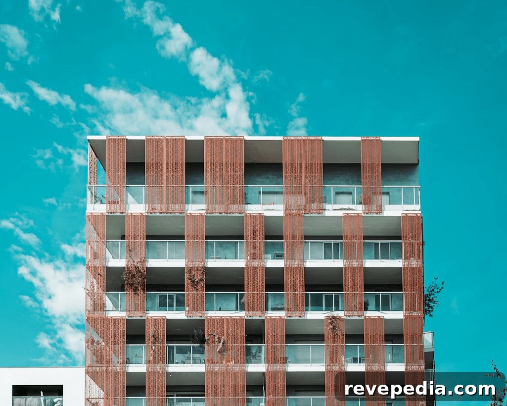 Managing Shared Driveways During Residential Renovations: A Practical Guide 2 Tall building with many windows, possibly under renovation or