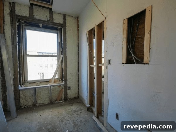 Secure Your Windows Against Break-Ins Without a Major Renovation 2 Unfinished room window before security upgrades