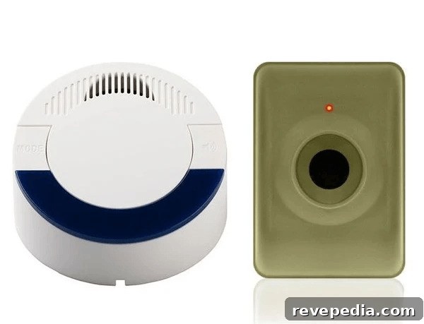 Secure Your Windows Against Break-Ins Without a Major Renovation 4 Two differently colored smoke detectors on a wall