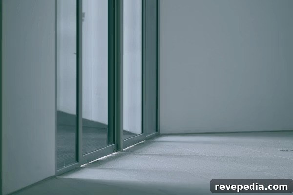 Top Home Security Upgrades to Protect Your Property 5 Empty room with glass doors, a common home security