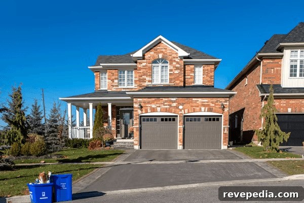 Exterior Design Trends That Elevate Your Home's Curb Appeal 3 Two-story brick house with two garages