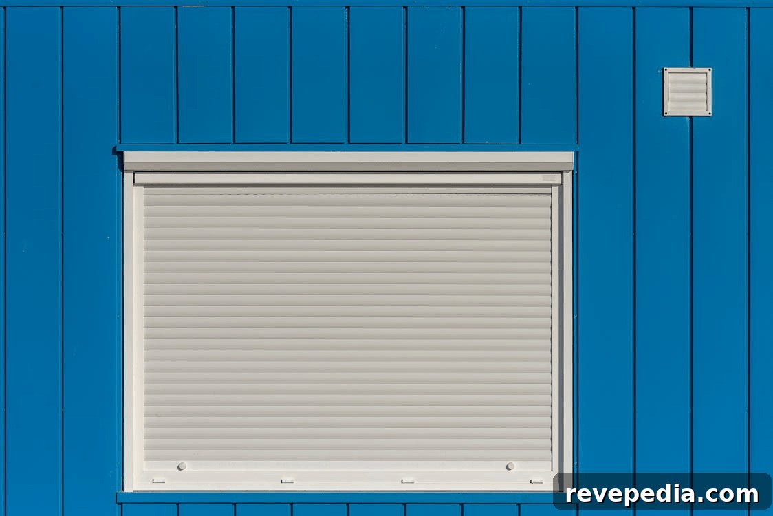 How to Strengthen Your Home to Survive Severe Storms 2 Blue building with white shutter, ready for a storm