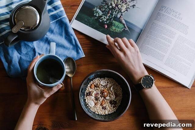 7 Fresh Tea Traditions to Try for International Tea Day 3 Person enjoying breakfast cereal and a book at a table