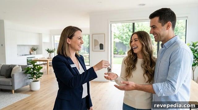 agent handing keys to new homeowners