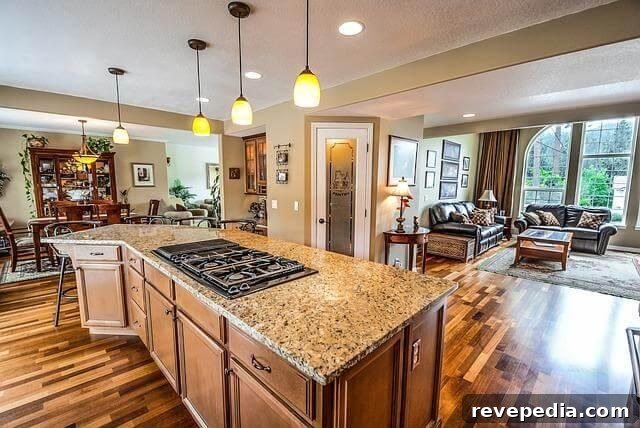 Why You Need Routine Home Inspections Before Buying or Selling 3 A kitchen with a stove top oven being inspected