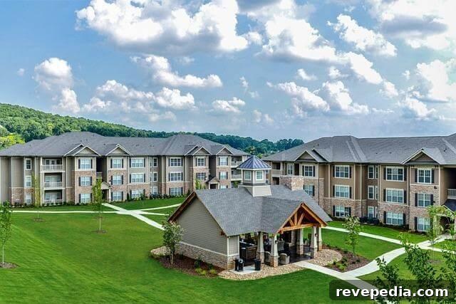 Buying an Apartment vs Renting: Which Is Right for You? 2 Apartment buildings in a green field, representing housing