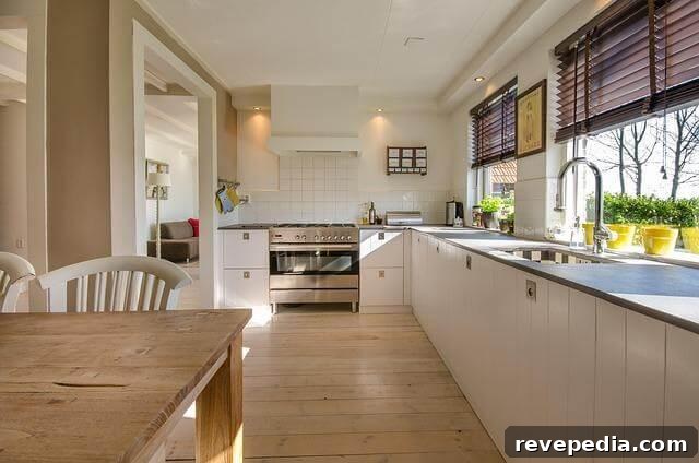 Designing a Home That Still Works 10 Years Later: Practical Remodeling Tips 2 Modern kitchen with wooden table and white cabinets