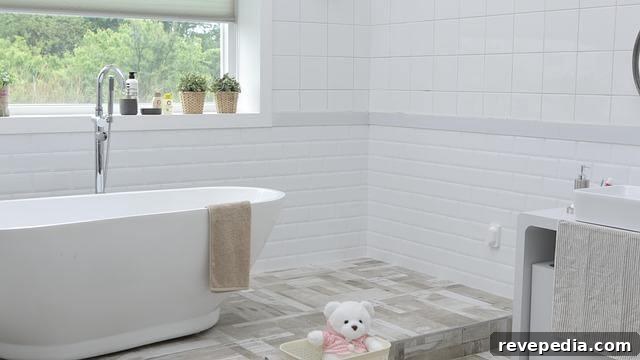 4 Timeless Bathroom Designs That Beat Passing Trends 2 White bathroom with tub and a teddy