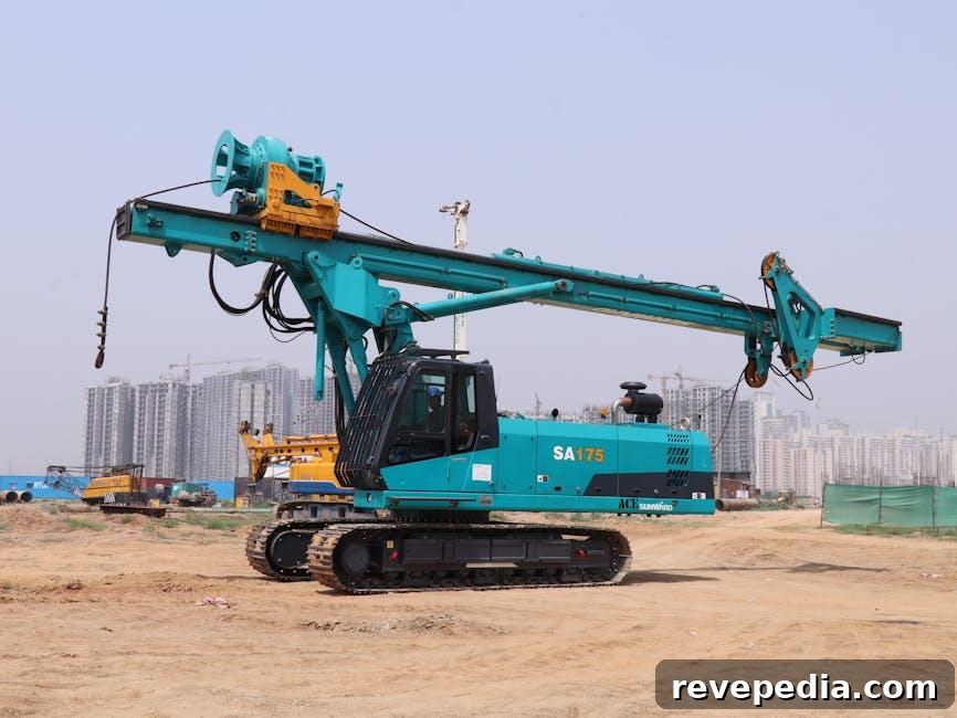 Helical Piles Explained: Faster Foundation Installation Guide 3 A tracked machine installing a foundation of Helical Piles