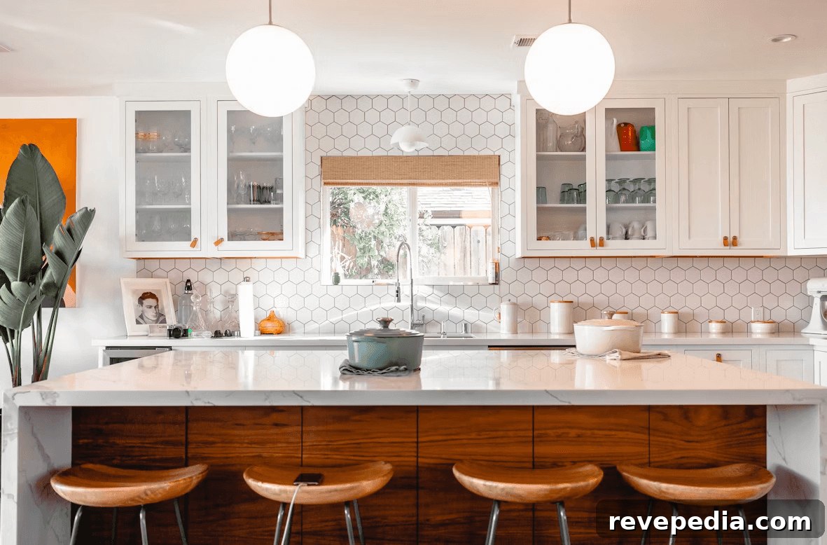 How to Organize a Vacation or Second Home You Rarely Use 2 Modern kitchen with a center island and three stools