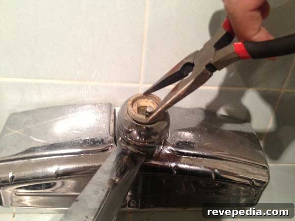 Stop a Dripping Kitchen Faucet: Quick Fixes and Tips 5 remove-collar