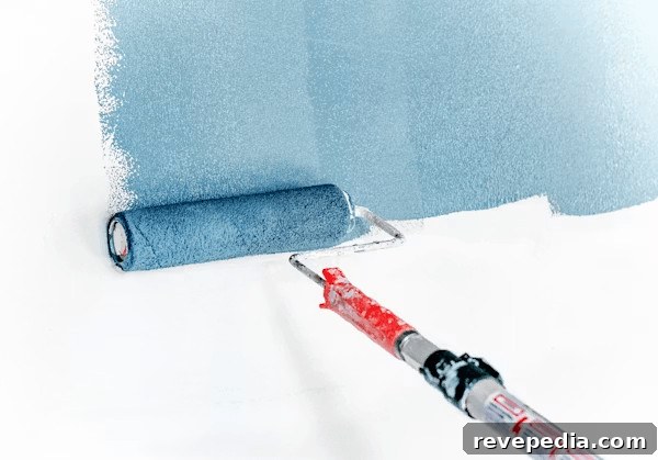 Exterior Painting Mistakes Homeowners Make Before the First Coat 3 Two rollers for blue paint, suggesting preparation for exterior
