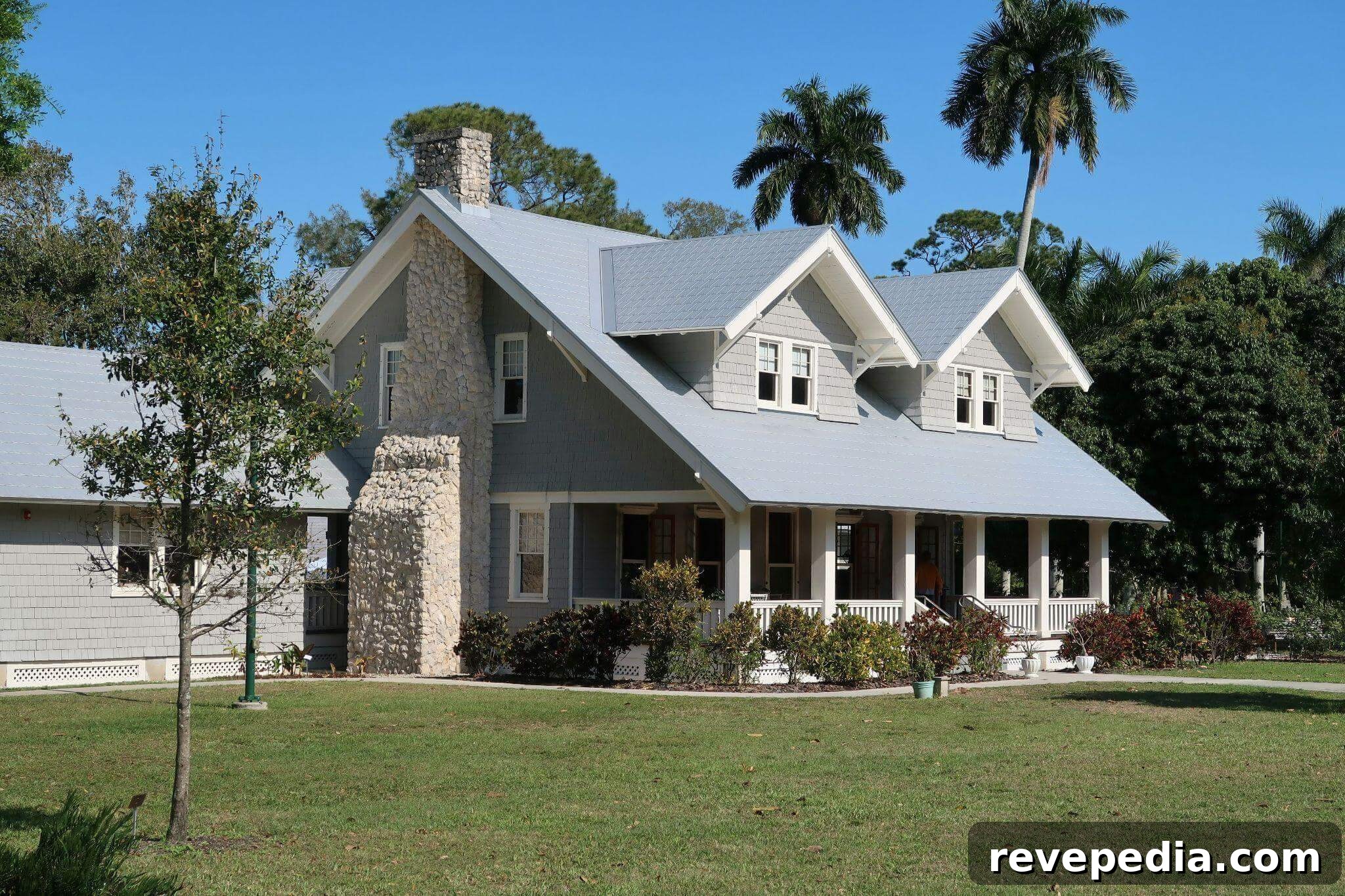 New Home? 10 Essential Projects to Do Before Moving In 2 House with a gray roof and white trim