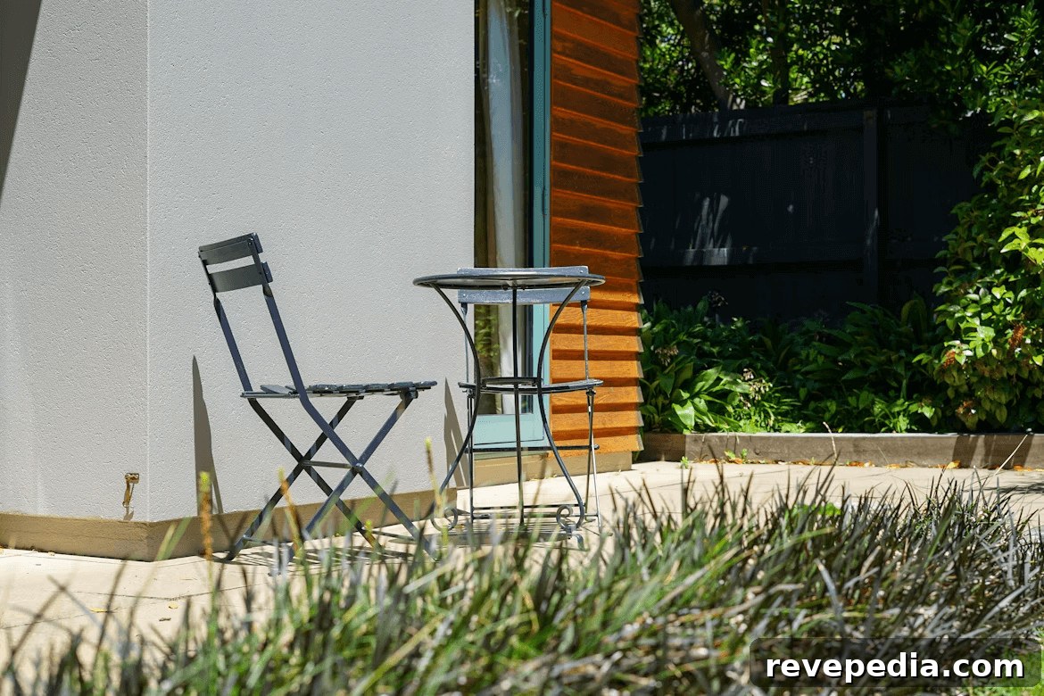 Two chairs and a table on a newly built