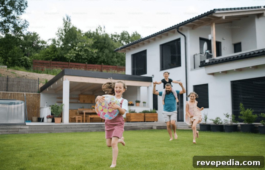 Cut Home Maintenance Time and Enjoy Your Home More 2 Kids happily playing frisbee in a maintained home yard
