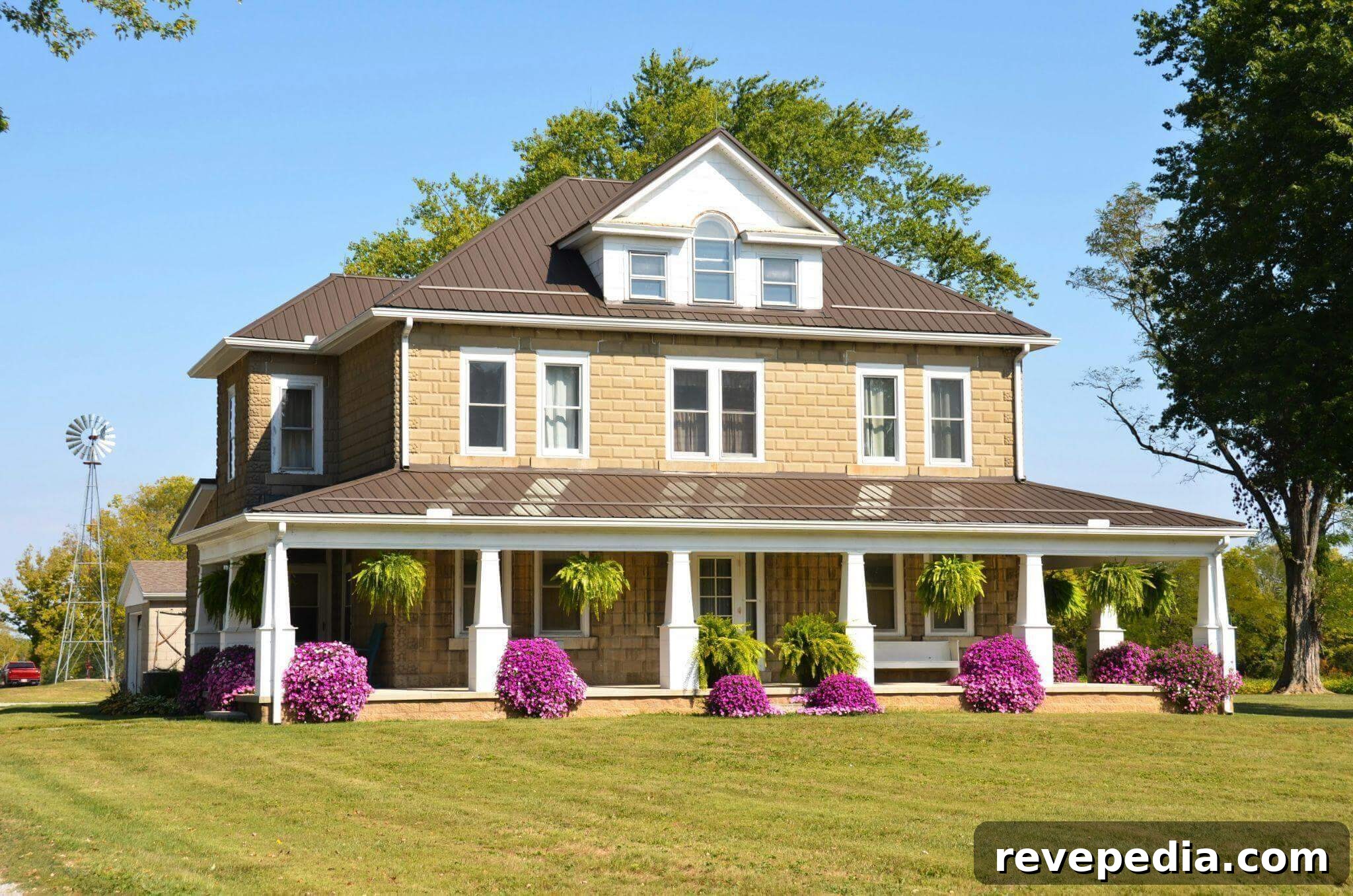 Cut Home Maintenance Time and Enjoy Your Home More 3 Large house with colorful flowers in the garden
