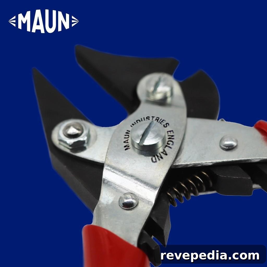 Close-up of parallel pliers on a blue