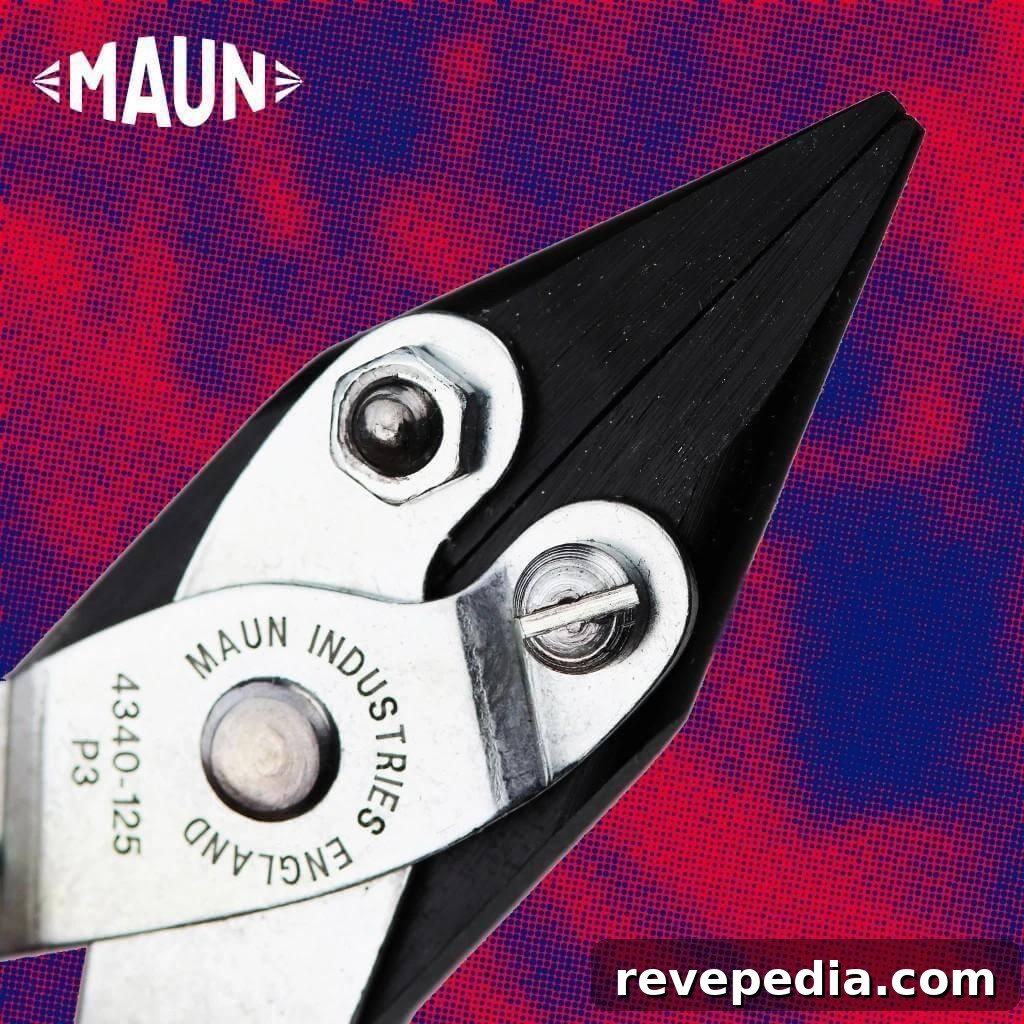 A pair of parallel pliers on a purple and red