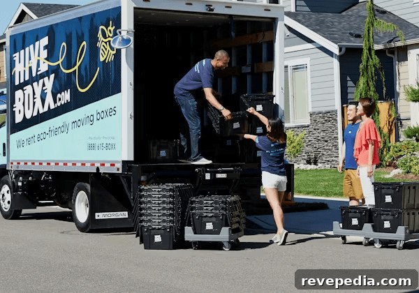 Lenexa Moving Company Checklist for First-Time Homebuyers 2 Man unloading a box from a moving truck in