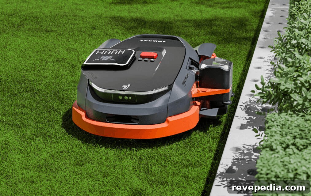 Lawn mower on lush green field for yard maintenance