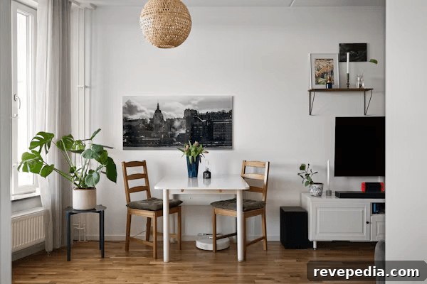 A small furnished apartment room with a table,